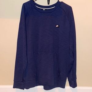 Navy Nike sweatshirt.